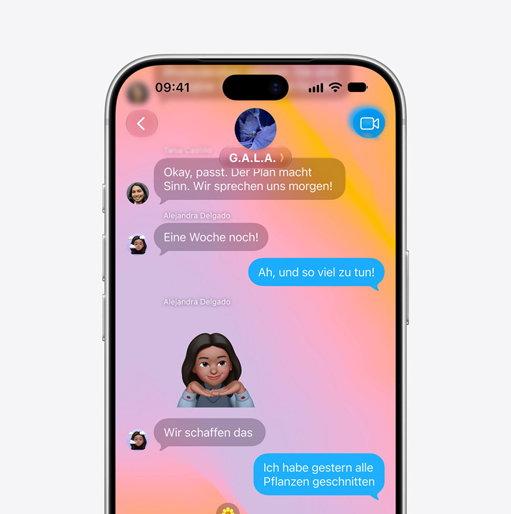 iPhone screen open to Messages app. Screen shows text conversation between two people that includes a Memoji.