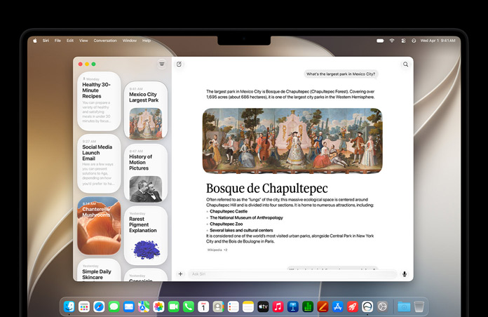Vista frontal do MacBook Pro de 14 polegadas, preto sideral, o ecrã a mostrar a app Siri com uma conversa ativa da Siri AI e conversas anteriores na barra lateral.