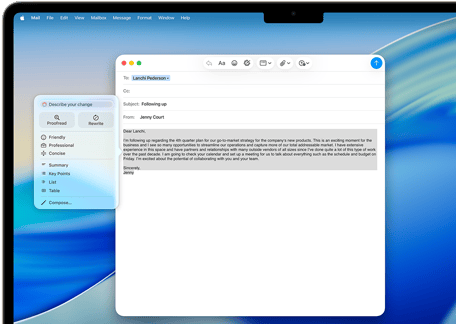 MacBook Air screen showing Apple Intelligence Writing Tools composing an email