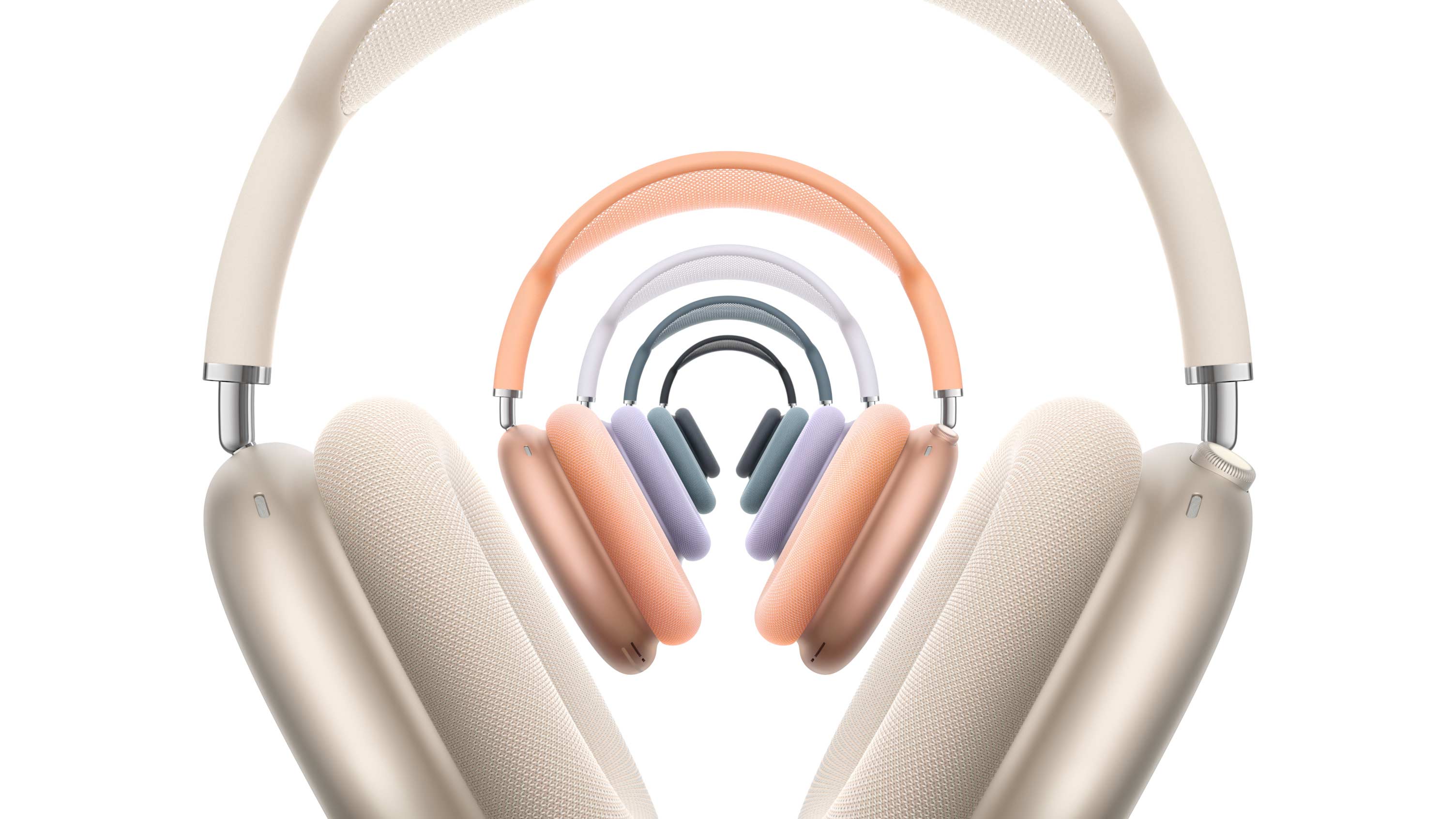 خمسة أزواج من سماعات الرأس AirPods Max 2، الجهة الخارجية الأمامية، مكدسة، بلون ضوء النجوم وبرتقالي وليلكي وأزرق وسماء الليل