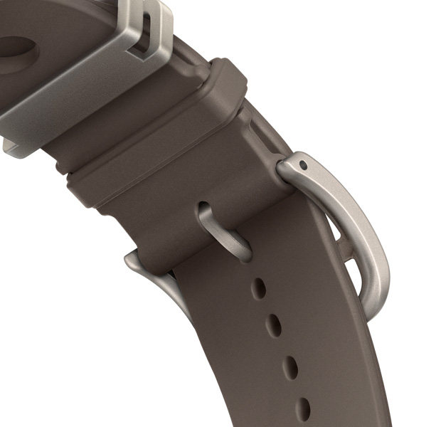 Apple Watch Hermès Ultra 4 Scub’H Diving 밴드의 모습. 그리 티탄 색상(회색)에 클라스프 아랫쪽의 디테일과 부드러운 성형 고무 소재에 중앙에 원형 구멍이 뚫려 있는 모습