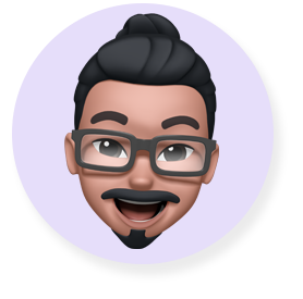 Smiling Memoji face - a bearded man in glasses