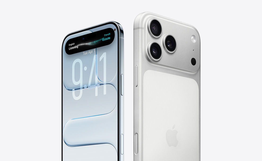Uz iPhone 16 Pro aizmugures tuksneša titāna krāsā ir trīs kameras objektīvi, bet priekšplānā ir cits iPhone 16 Pro, kura ekrānā ir izceltas Dynamic Island iespējas.